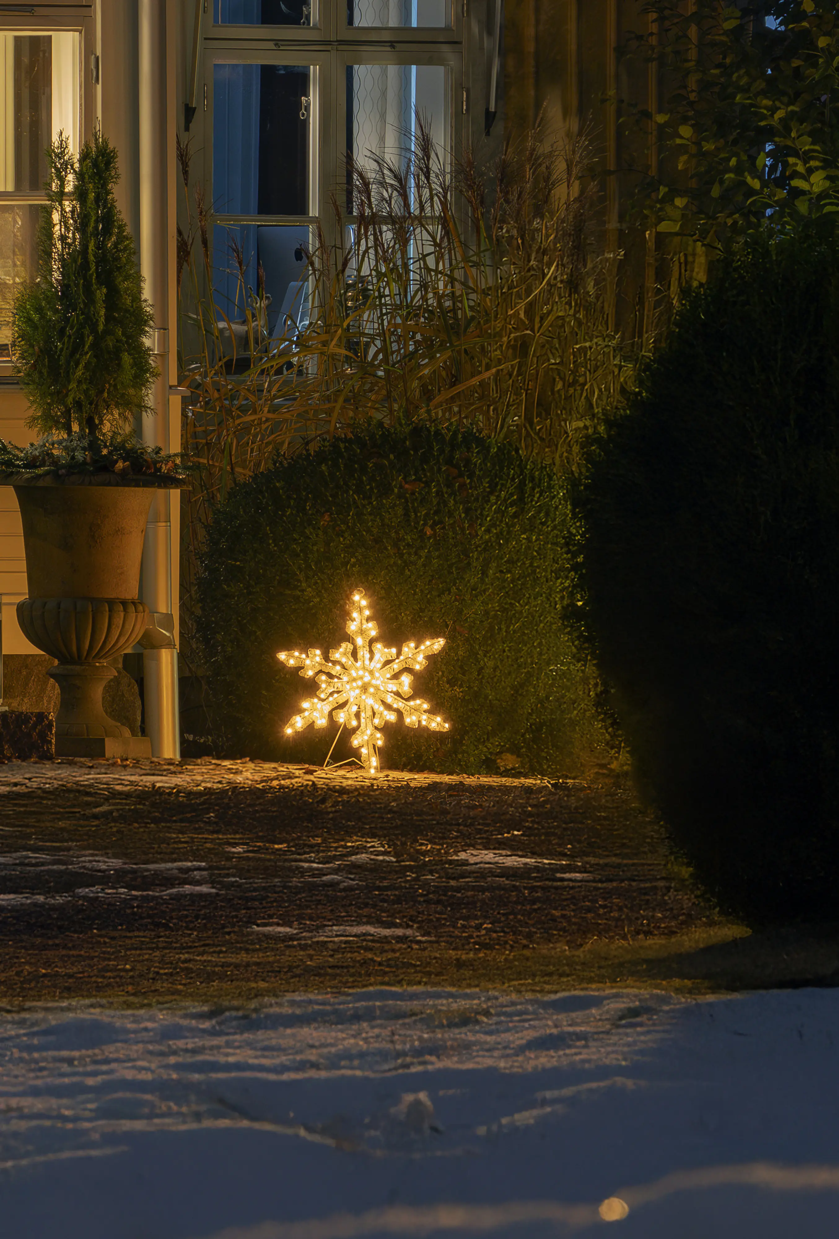 Konstsmide LED Weihnachtsdeko Schneeflocke 60 cm bernstein