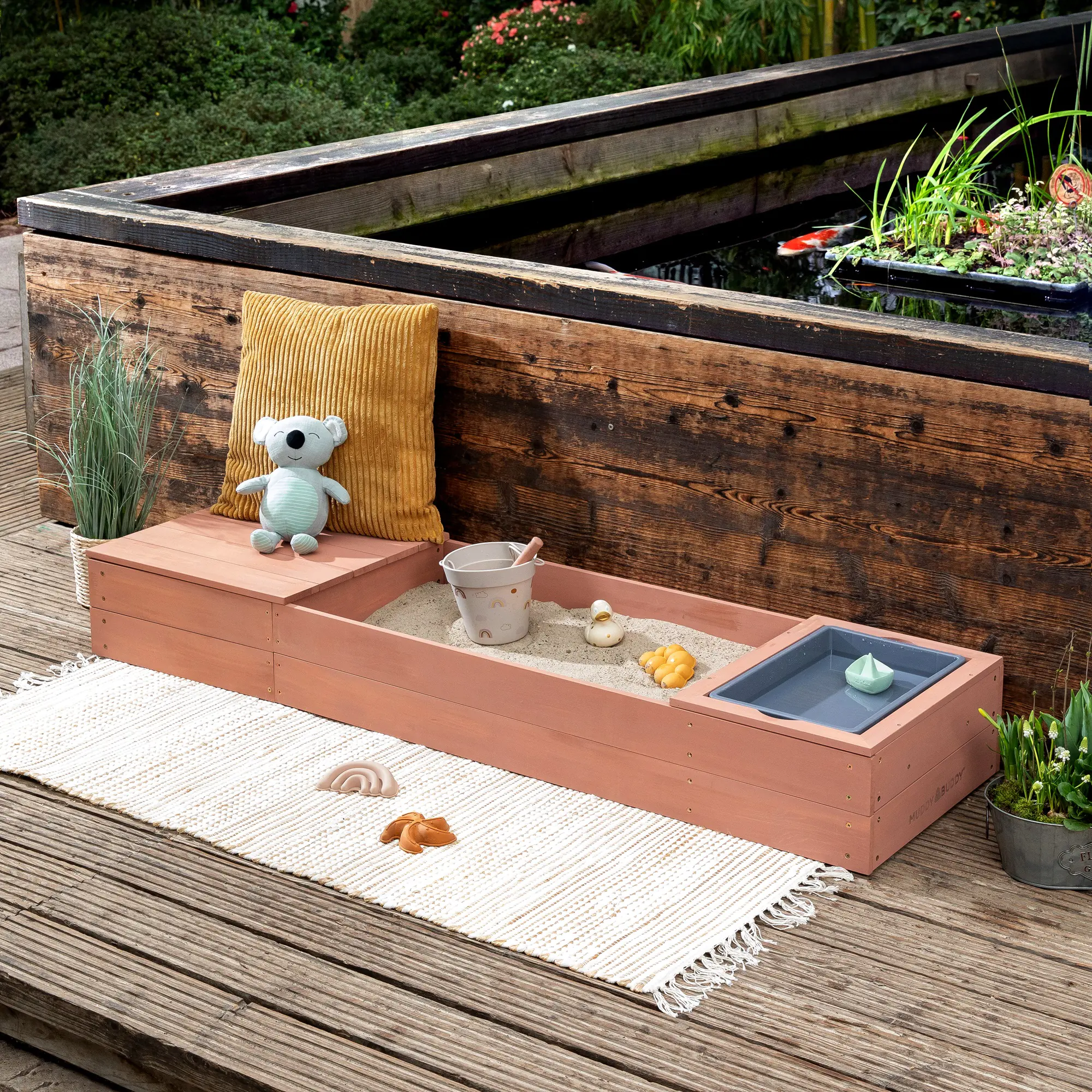 MUDDY BUDDY® Sandkasten Space Saver puderrosa