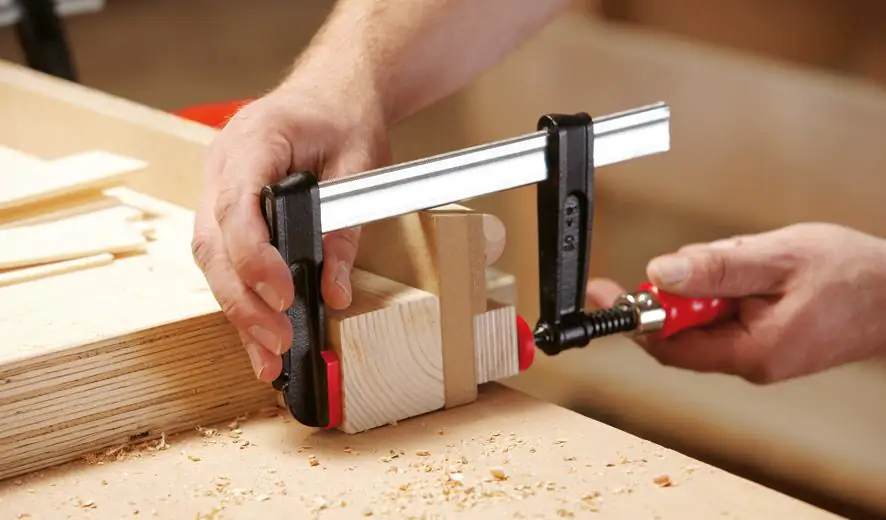 Bessey Tempergusszwinge mit Schutzkappen Bessey Tempergusszwinge mit Schutzkappen
