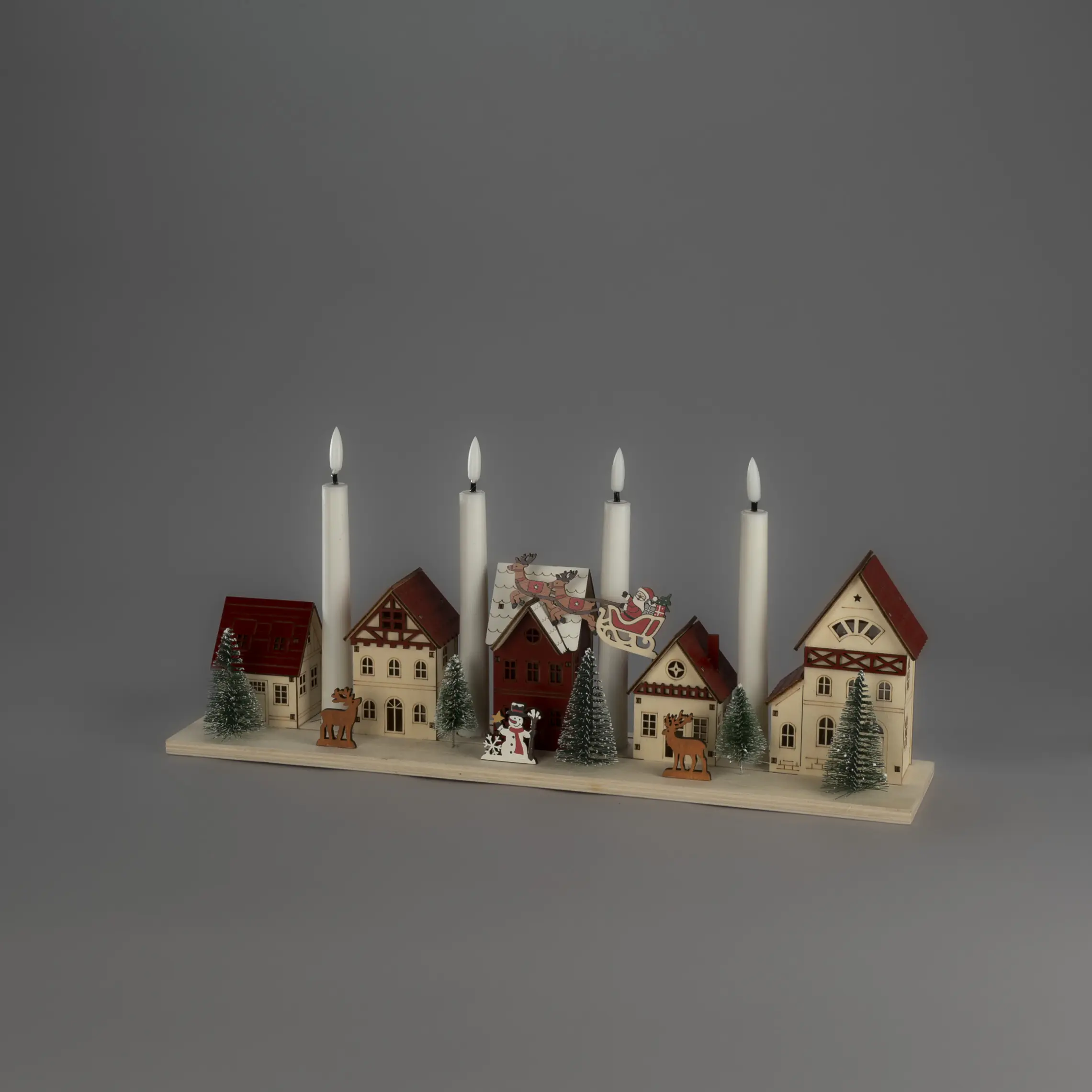 Konstsmide LED-Holzsilhouette Miniaturhäuser batteriebetrieben mit Timer 47 x 20,5 cm warmweiß