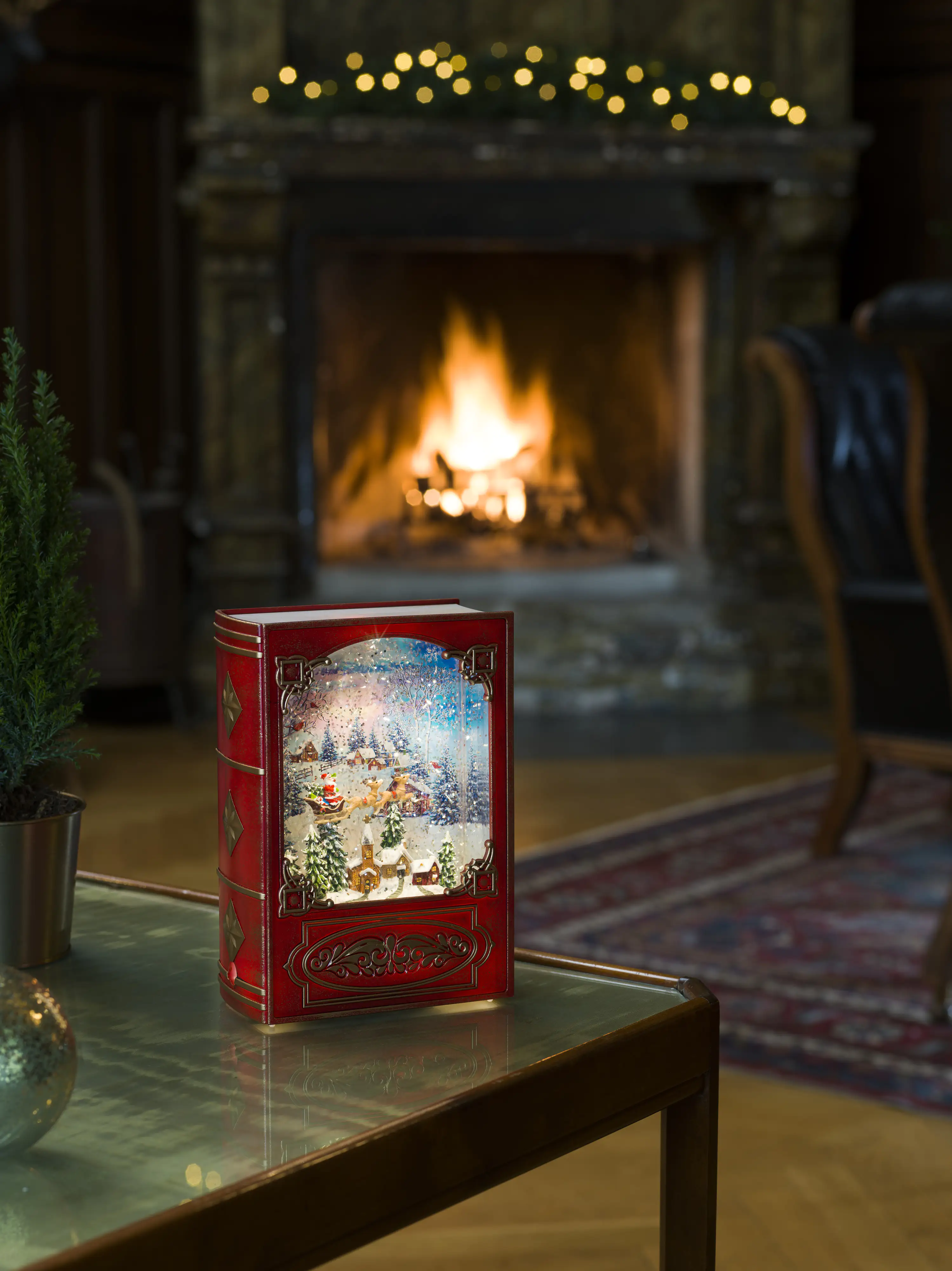 Konstsmide LED Wasserlaterne Buch rot Weihnachtsmann im Schlitten mit Rentieren über Dorf, für Innen Konstsmide LED Wasserlaterne Buch rot Weihnachtsmann im Schlitten mit Rentieren über Dorf, für Innen