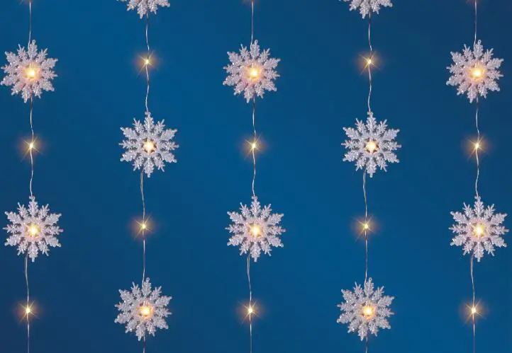 TrendLine LED-Lichtervorhang Schneeflocke Außen 60 x 150 cm warmweiß mit Timer TrendLine LED-Lichtervorhang Schneeflocke Außen 60 x 150 cm warmweiß mit Timer