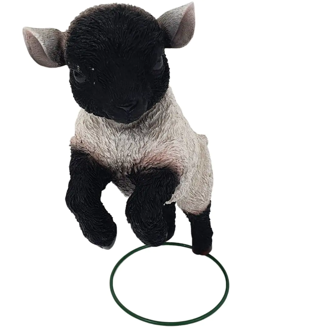 Dekofigur Lamm springend 30 x 20,5 x 13,5 cm schwarz weiß