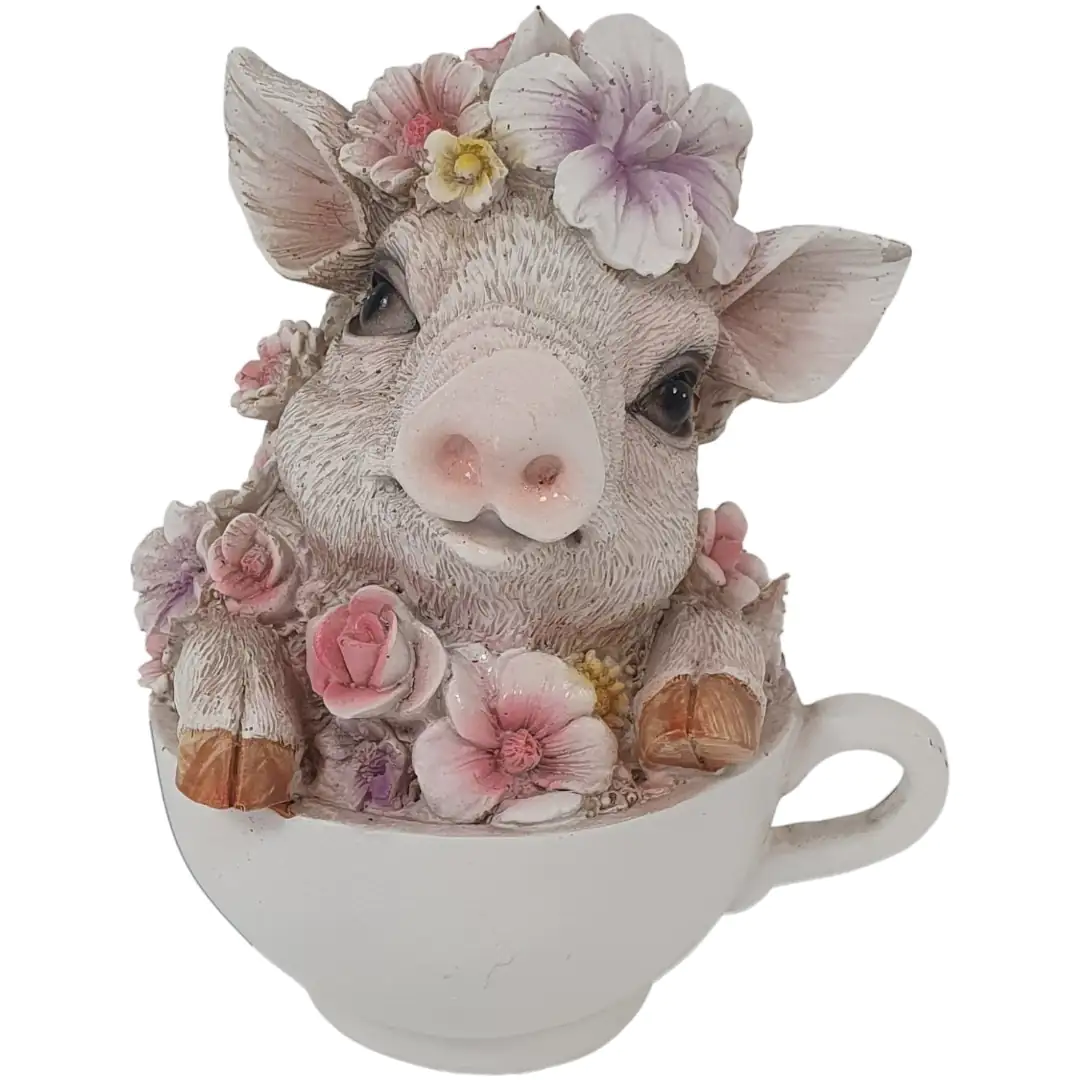Dekofigur Schwein mit Blumen in Tasse 15 x 12,5 x 10,5 cm weiß rosa